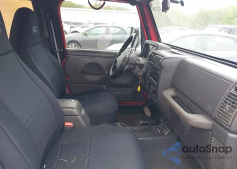 1999 Jeep Wrangler Sport z USA, uszkodzony, nr VIN 1J4FY19S0XP482218